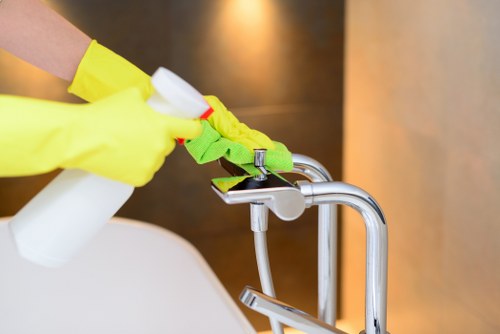 Professional Sutton cleaners handling delicate garment care